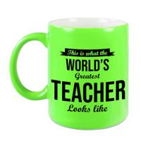 Worlds Greatest Teacher cadeau mok / beker voor juf / meester neon groen 330 ml - feest mokken