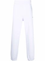 MSGM pantalon de jogging fuselé à logo imprimé - Blanc