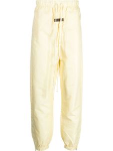 FEAR OF GOD ESSENTIALS pantalon de jogging à patch logo - Jaune