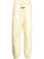 FEAR OF GOD ESSENTIALS pantalon de jogging à patch logo - Jaune