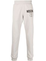 Moschino pantalon de jogging fuselé à logo - Gris - thumbnail