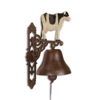A LARGE CAST IRON COW BELL