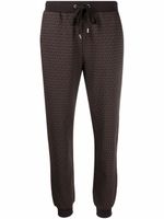 Michael Kors pantalon de jogging à motif monogrammé - Marron