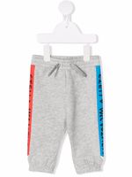 Stella McCartney Kids pantalon de jogging à logo latéral - Gris