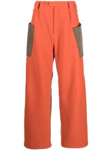 Kiko Kostadinov pantalon ample Meno à empiècements - Orange