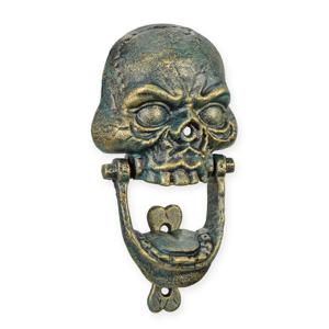 A CAST IRON SKULL DOOR KNOCKER