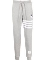 Thom Browne pantalon de jogging à motif Hector brodé - Gris