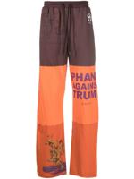 Marine Serre Regenerated broek met wijde pijpen en patchwork - Oranje