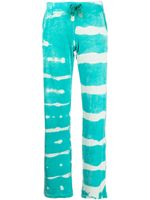 Stain Shade pantalon de jogging à imprimé tie-dye - Vert