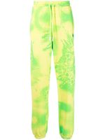 Marcelo Burlon County of Milan pantalon de jogging à imprimé tie dye - Jaune