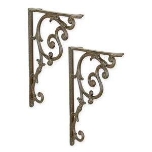 A PAIR OF CAST IRON WALL BRACKETS