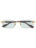 Gucci Eyewear lunettes de soleil GG1221S à monture rectangulaire - Or