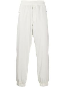 Moncler Grenoble pantalon de jogging à taille élastiquée - Blanc