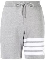 Thom Browne short de sport à détail 4 bandes signature - Gris